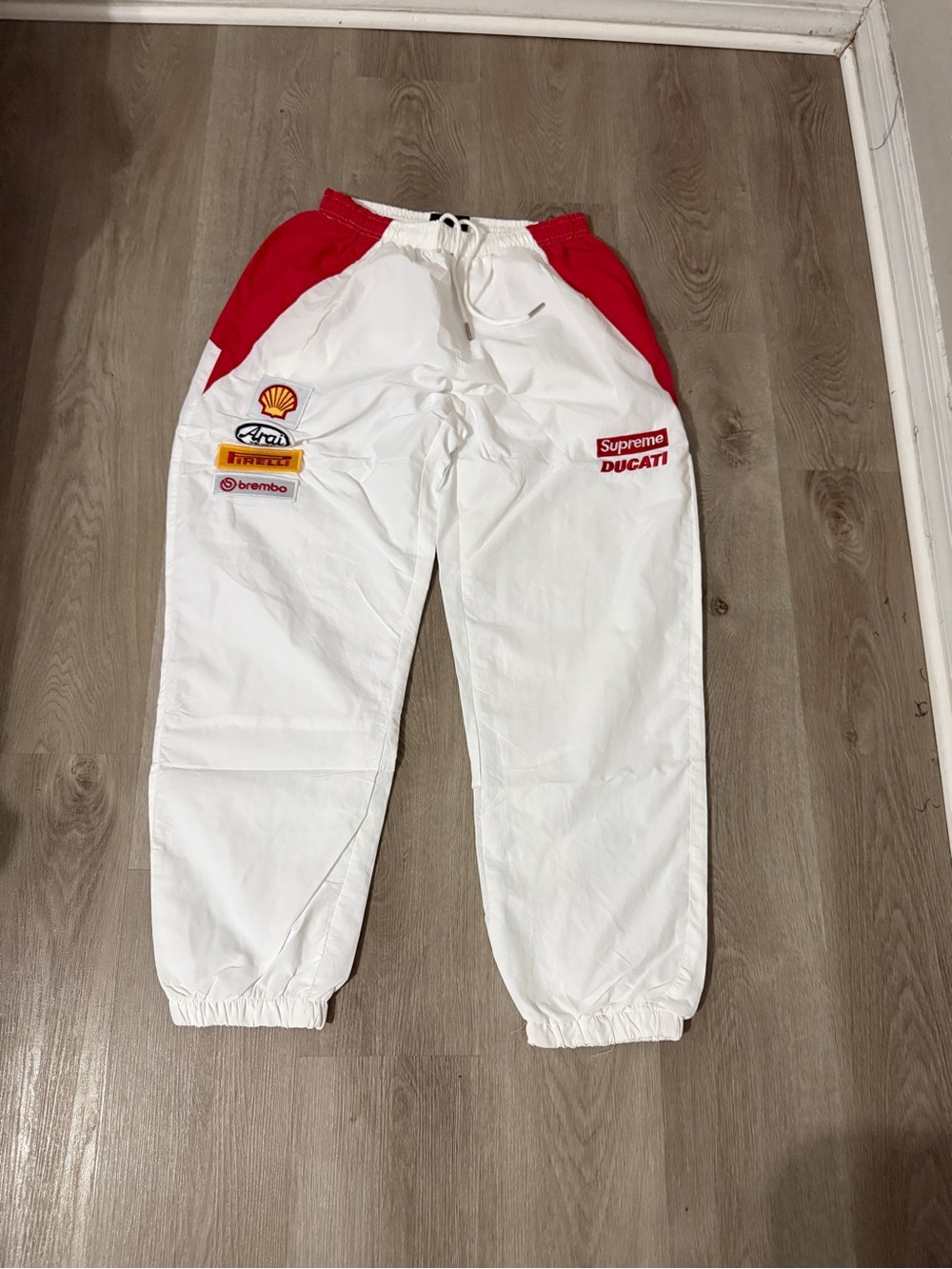 Supreme White and Red Logo Racing Track Pants